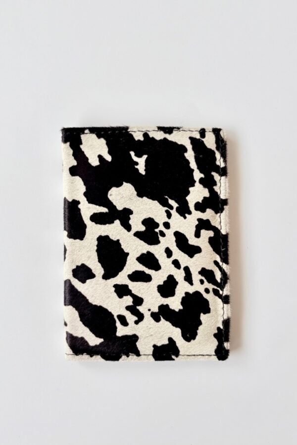 Cream and black passport holder